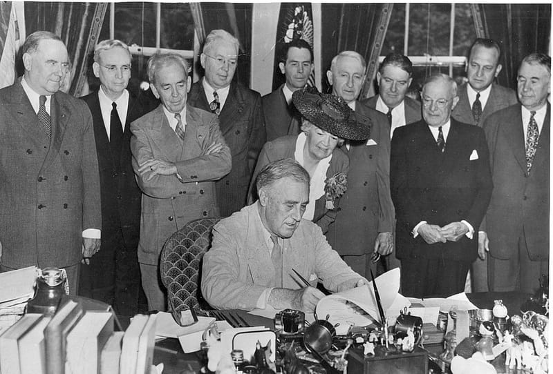 President Franklin D. Roosevelt signing the G.I. Bill