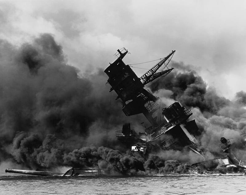The battleship USS Arizona burning after the Japanese attack