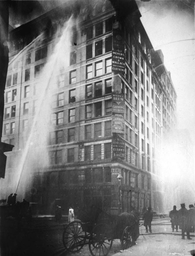 Smoke pouring from the building during the Triangle Shirtwaist Factory fire